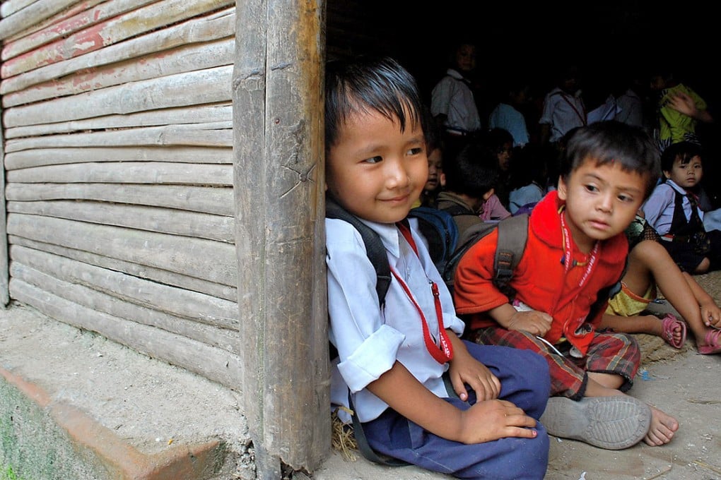 Young children attend a bamboo school in Kathmandu, Nepal. What started as cheap alternative schooling has expanded to 19 districts. Photo: Bibek Bhandari