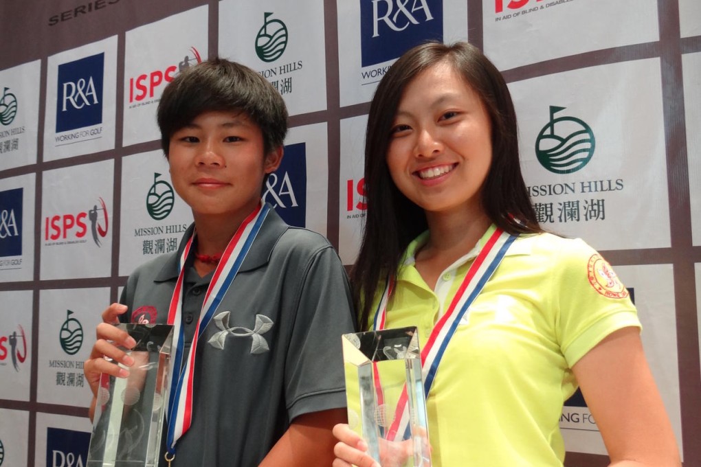 Isaac Lam and Kitty Tam at the awards presentation after their wins in the Hong Kong leg of the Faldo Series at Kau Sai Chau. Photo: Kevin Kung
