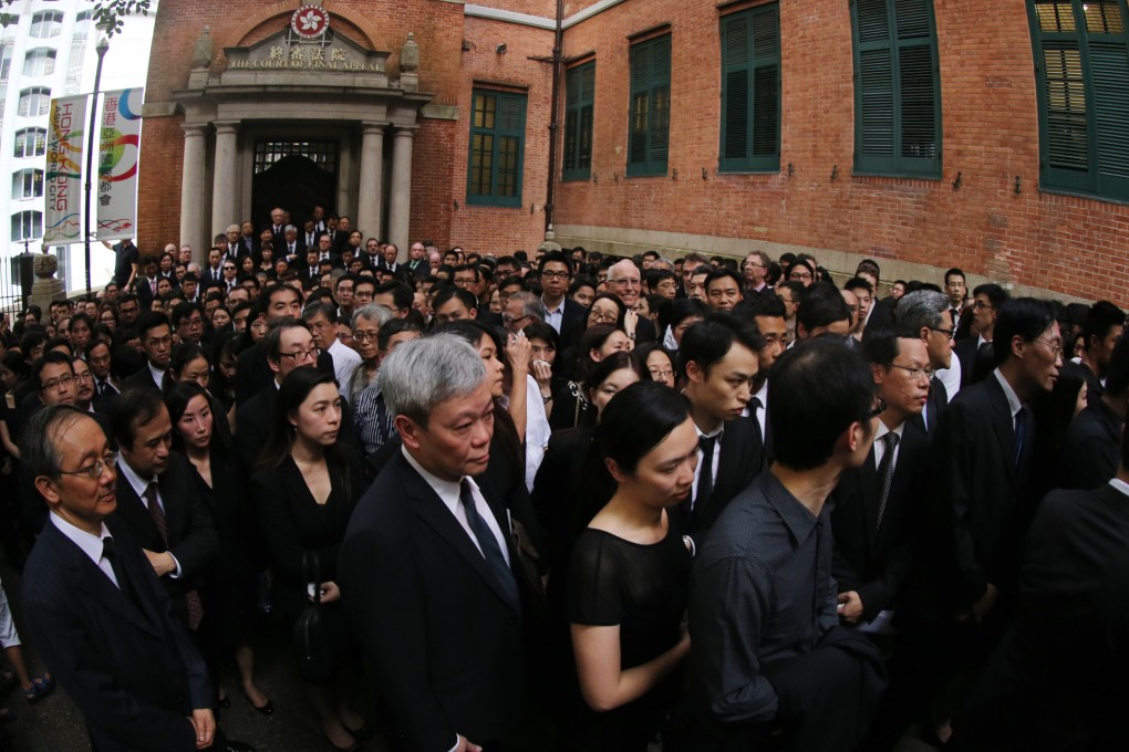 Hundreds of lawyers marched silently on the streets of Central to protest against Beijing's White Paper, which called for all involved in 'administering' Hong Kong, including judges, to be patriotic. Photo: K.Y. Cheng