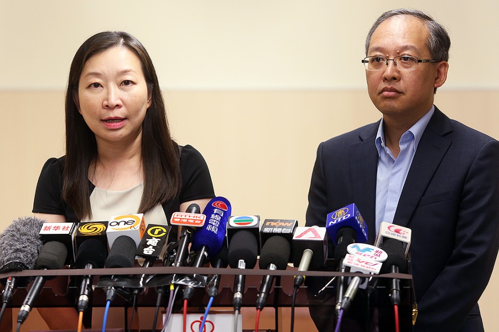 The Centre for Health Protection's Dr Chuang Shuk-kwan (left) and Hospital Authority's Chief Infection Control Officer, Dr Dominic Tsang (right), speak to the media about measures to counter the deadly Ebola virus. Photo: Sam Tsang