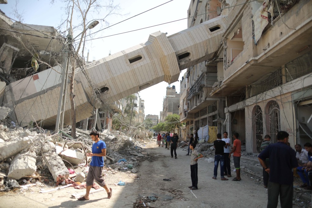 Palestinians inspect the damage of Al-Sousi mosque that was destroyed in an Israel strike, at the Shati refugee camp, in the northern Gaza City. Photo: Xinhua