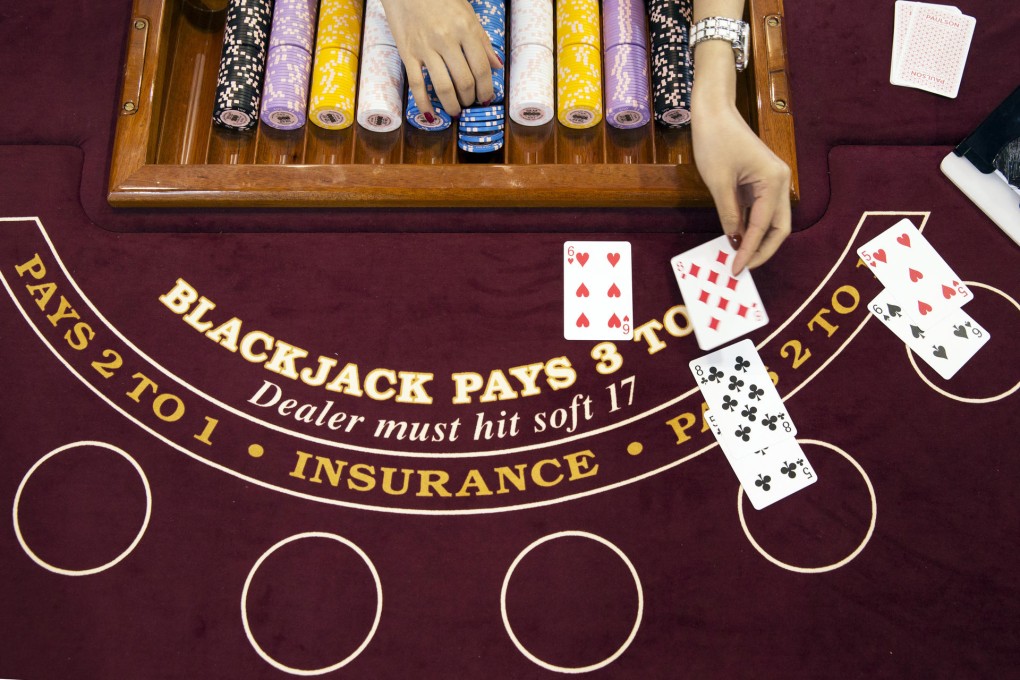 Macau's gross gaming revenue dropped 3.6 per cent last month to 28.42 billion patacas, in line with market expectations. Photo: Bloomberg