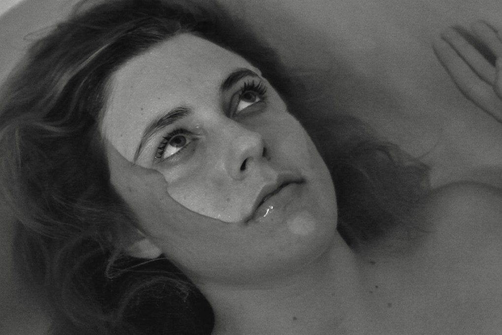 Greta Gerwig soaks in a bath. Photos: AFP