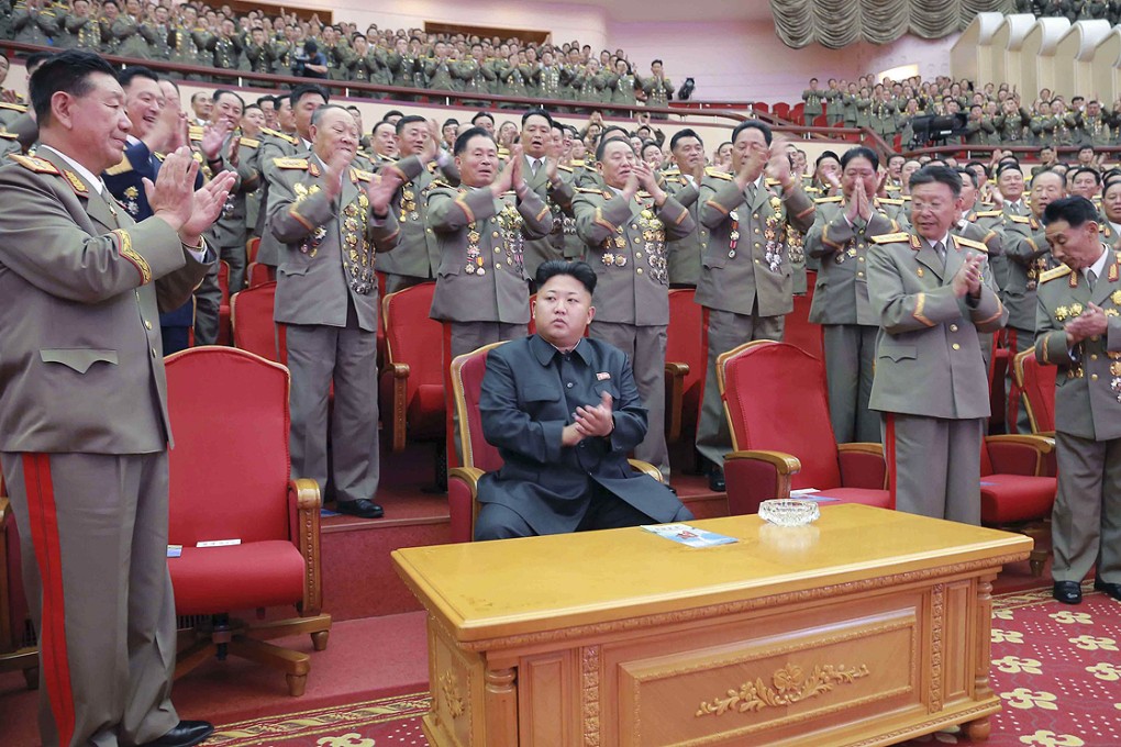 North Korean leader Kim takes his seat during a performance at the People's Theatre in Pyongyang earlier this month. Photo: Reuters