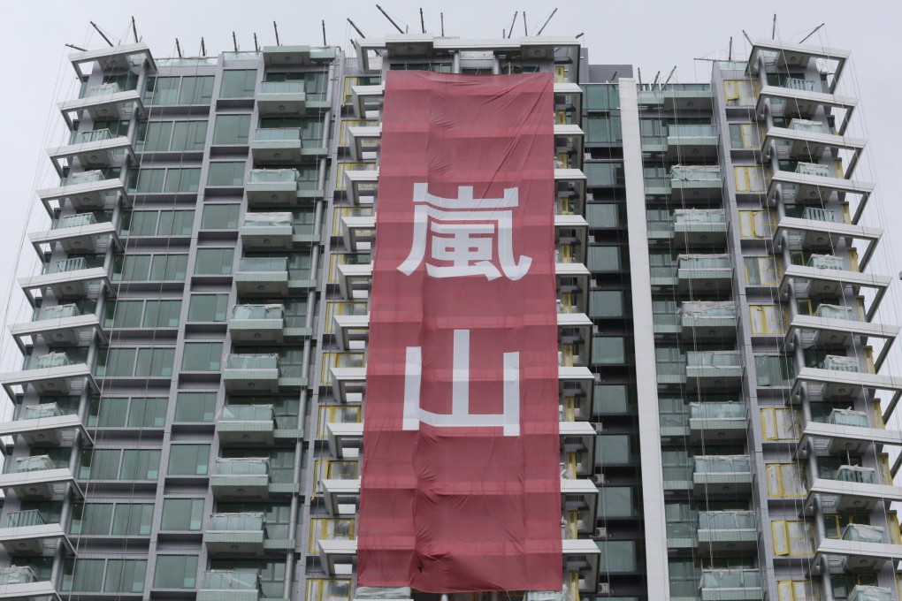 Cheung Kong's property sales in the first-half edged up 1.62 per cent to HK$12.52 billion as government cooling measures to curb demand in Hong Kong and on the mainland took their toll. Photo: Felix Wong