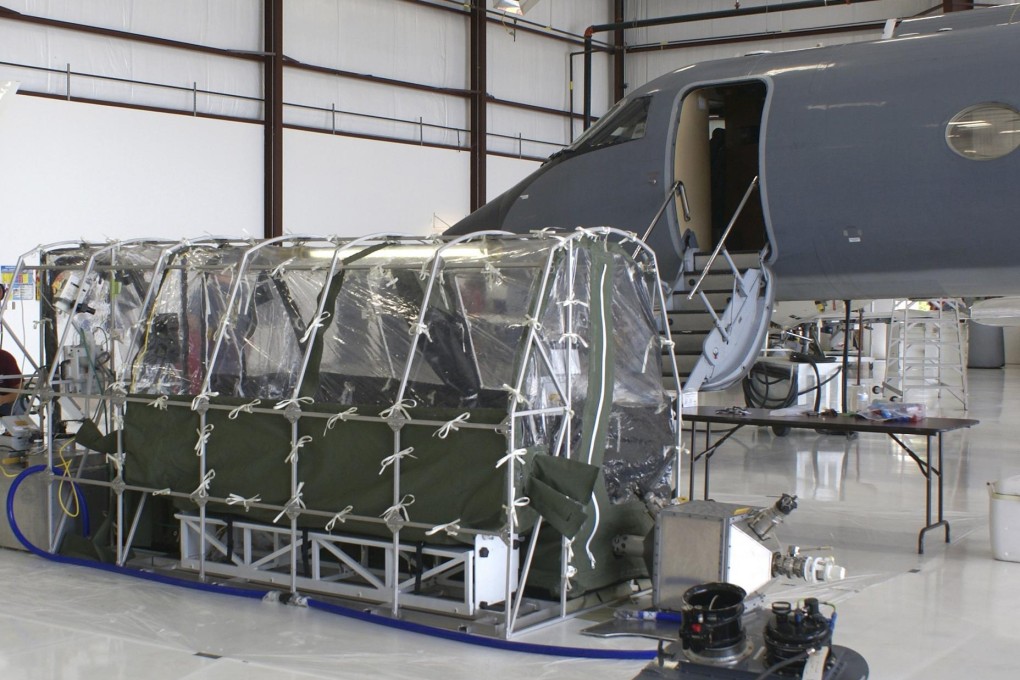 A tent-like device installed in an aircraft is used for the emergency movement of people exposed to diseases such as Ebola. Photo: Reuters