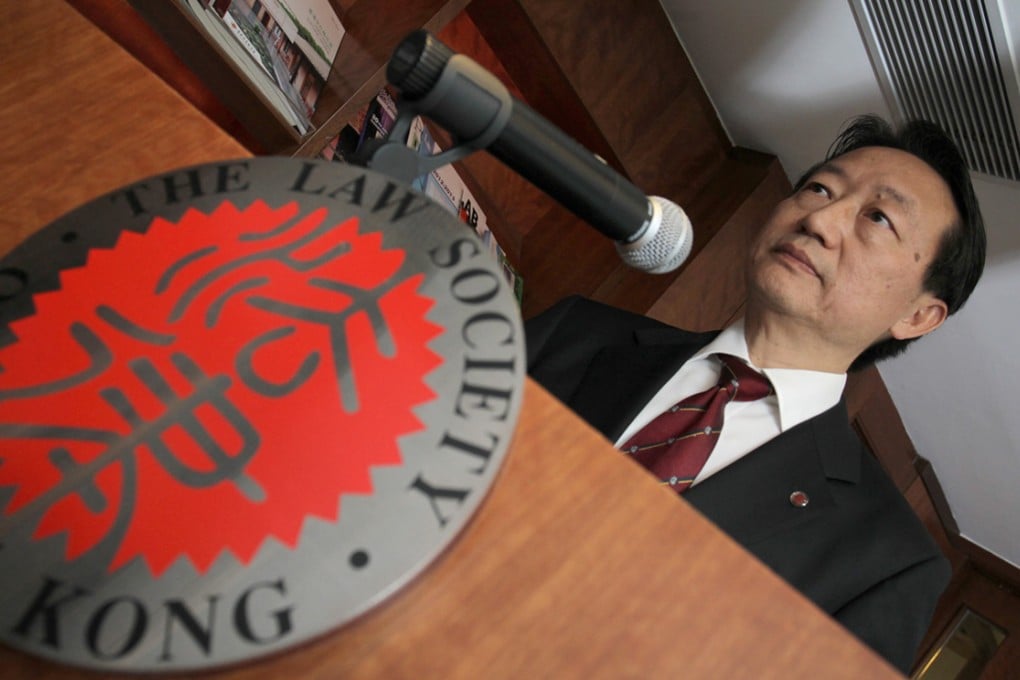 Law Society president Ambrose Lam said in a statement that the report by Apple Daily was "a relentless attack" on him, his wife and family. Photo: Dickson Lee