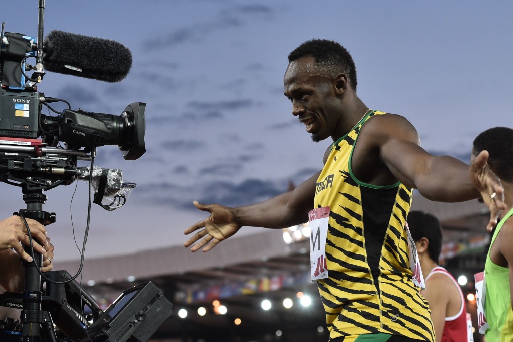 Usain Bolt enjoys soaking up the limelight under his conditions. Photo: AFP