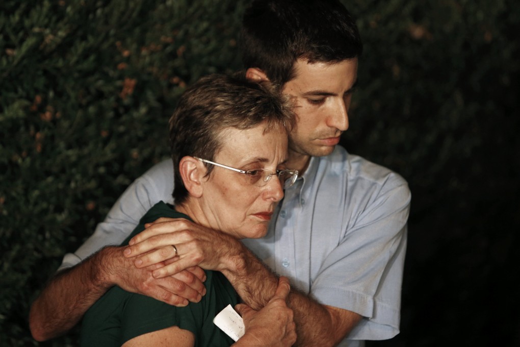 Mother Lea and brother Haimi of Israeli soldier Hadar Goldin are seen during a news conference outside their home in Kfar Saba. Photo: Reuters