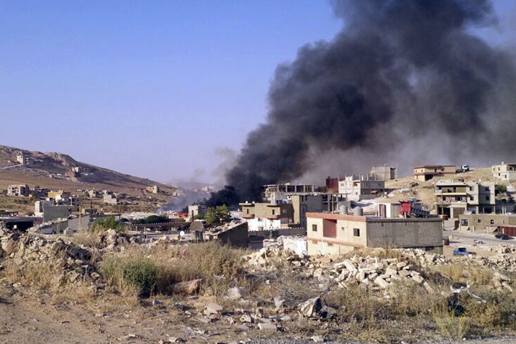 Syrian rebels raided Lebanese border town Arsal.