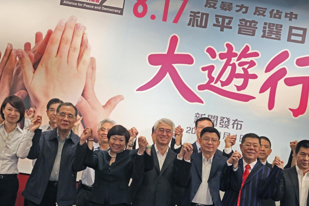 Alliance for Peace and Democracy chiefs explain the details of the August 17 anti-Occupy Central march from Victoria Park to Chater Garden. Photo: Felix Wong