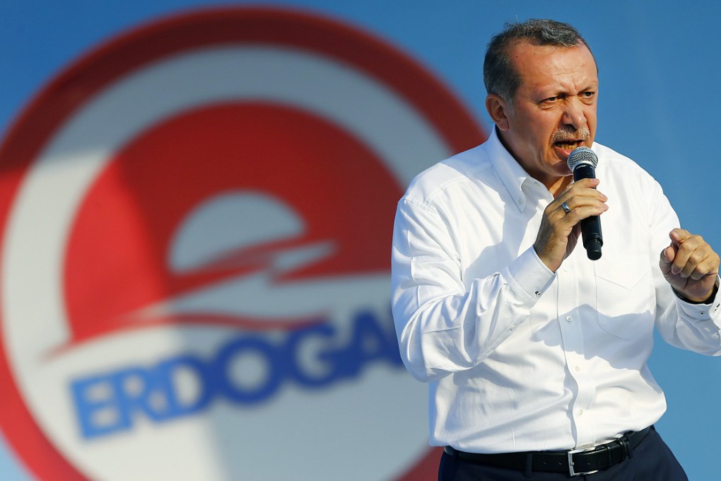 Turkey's Prime Minister and presidential candidate Tayyip Erdogan addresses his supporters during an election rally in Istanbul. Photo: Reuters