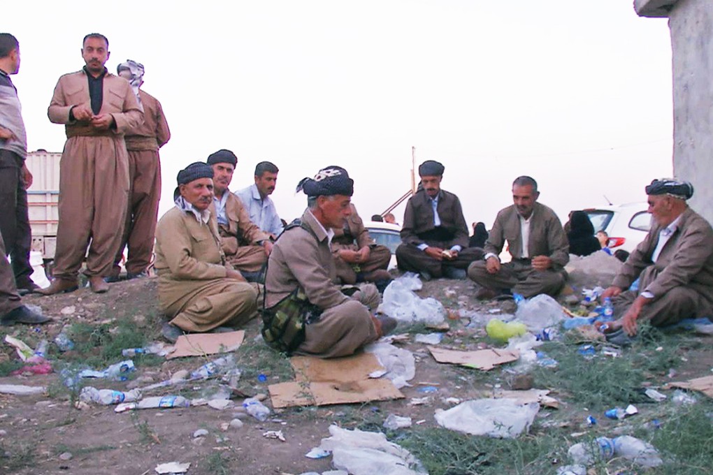 A video capture shows Iraqis people from the Yazidi community after arriving in Irbil in northern Iraq after Islamic militants attacked the towns of Sinjar and Zunmar. Photo: AP