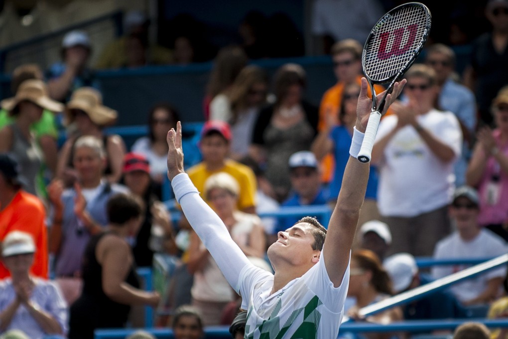 Milos Raonic celebrates the winning point against Vasek Pospisil in Stanford. Photo: EPA