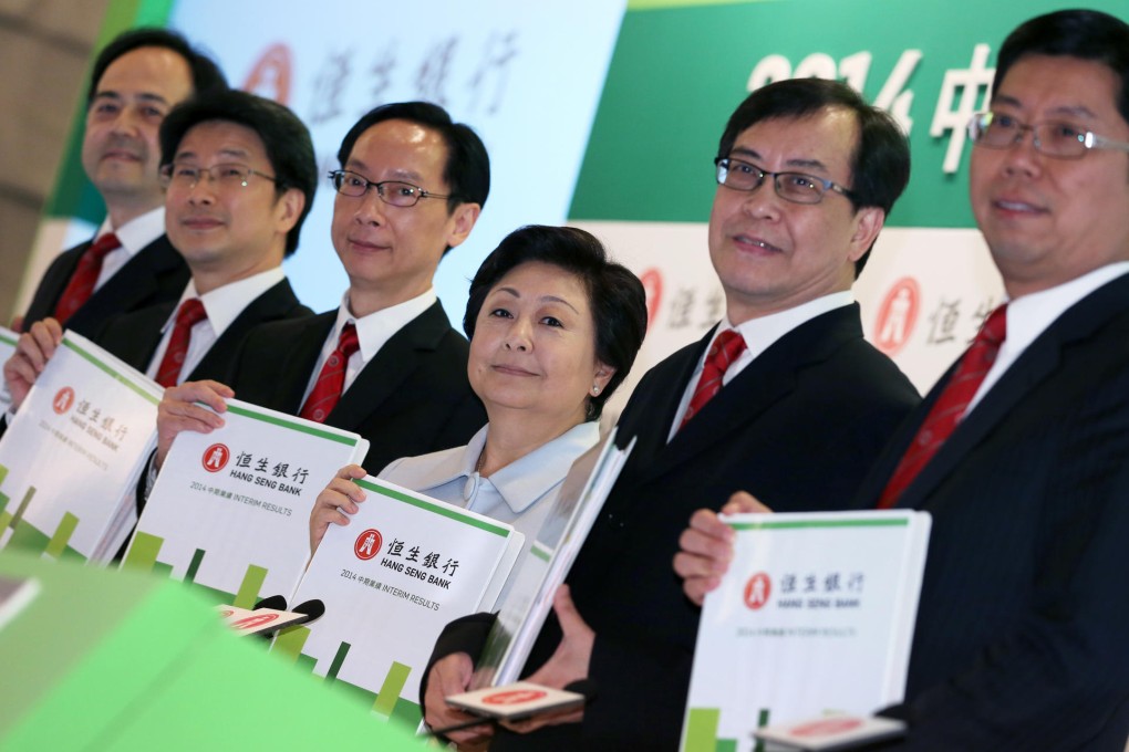 Rose Lee, the vice-chairman and chief executive of Hang Seng Bank, is flanked by her executive team at the company's results briefing yesterday. Photo: Nora Tam