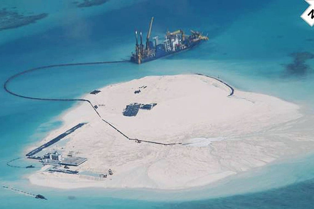 A reconnaissance photograph allegedly showing a Chinese ship expanding structures in the disputed Spratly Islands. Photo: AP