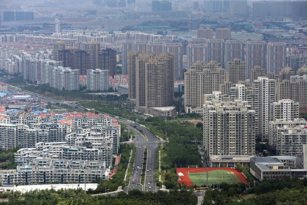 New residential buildings in downtown Qingdao city, Shandong province. Property developers are experiencing soaring debt ratios as the downturn in the mainland’s property market continues. Photo: EPA