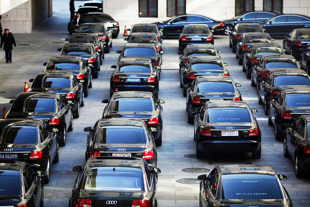 Government cars are parked at a parking lot inside the Great Hall of the People. Photo: Reuters