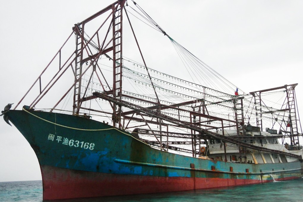The 12 fishermen were arrested at the Tubbataha Reef in April last year after their 48-metre boat hit and badly damaged it. Photo: EPA