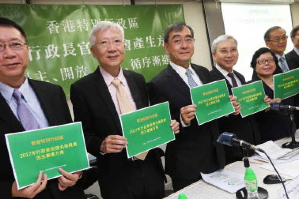 (Left to right) Francis Lui Ting-ming, Sung Yun-wing, Richard Wong Yue-chim, Liu Pak-wai, Lau Pui-king, Kwok Kwok-chuen and Vincent Kwan, members of 13-scholar group, meets the media to present its revised proposal for political reform. Photo: Sam Tsang