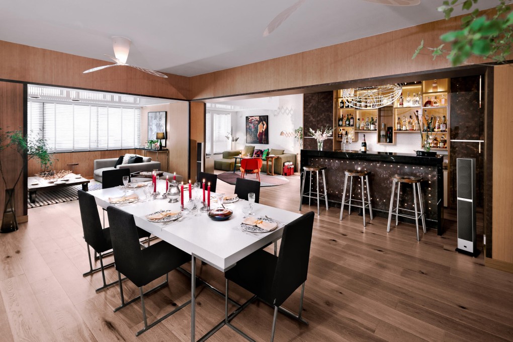 Empty nester turns old family flat into party home, complete with supersized bar-entertainment area