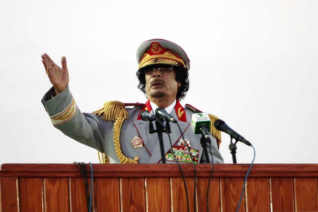 Libyan leader Muammar Gaddaffi speaks during a ceremony in Tripoli in June 12, 2010. Gaddafi was overthrown in late 2011 and died of wounds suffered in his capture near his hometown of Sirte. Photo: Reuters