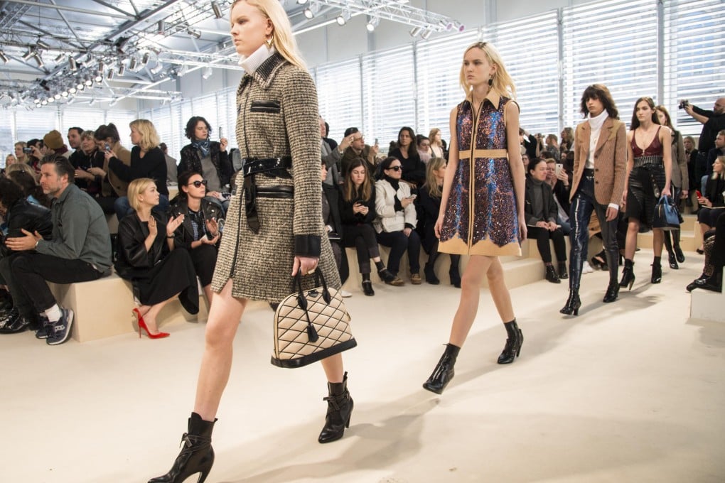 Louis Vuitton unveils a more subdued autumn-winter 2014-15 collection in Paris. Photo: Corbis