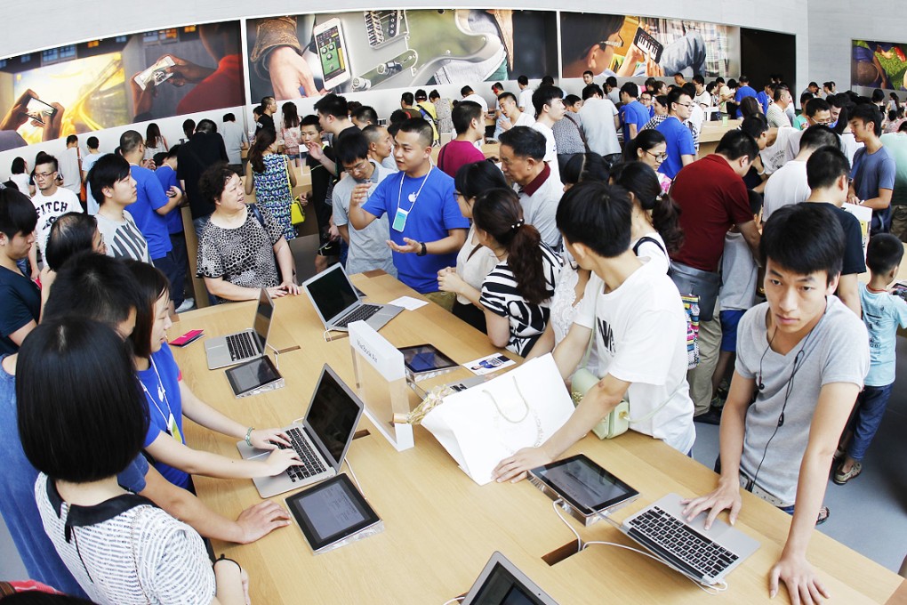 Apple Store in Jiangbei, Chongqing. Ten Apple products – including the iPad, the iPad Mini, MacBook Air and MacBook Pro – were omitted from a final government procurement list distributed last month. Photo: Xinhua