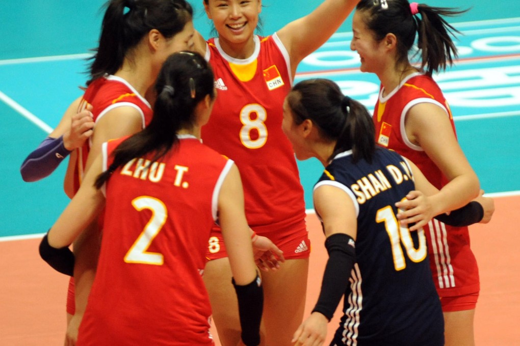 China's players celebrate after beating Thailand last night in a World Grand Prix clash at the Coliseum in Hung Hom. Photo: Xinhua