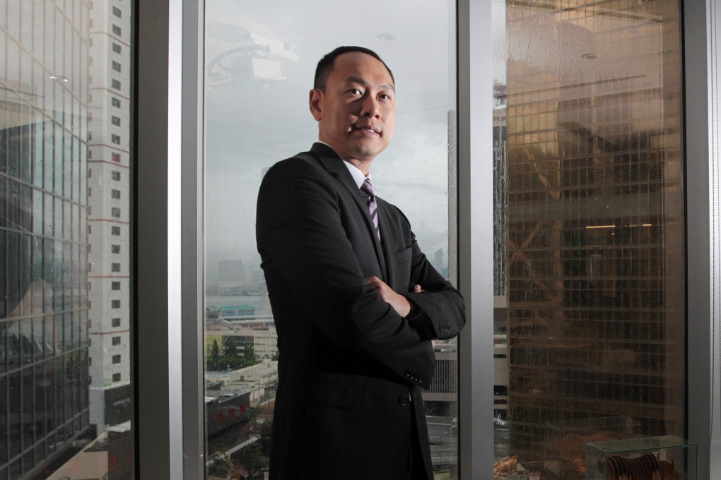 Chief executive Michael Choi says Sunwah Kingsway's clients are those who are typically willing to invest in high-risk companies for potentially high returns. Photo: Bruce Yan