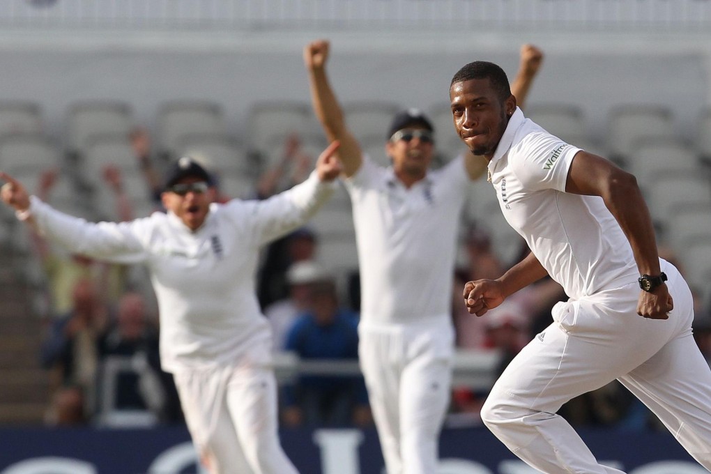 England's Chris Jordan takes the wicket of India's Pankaj Singh, sparking celebrations as the hosts triumph in the fourth test at Old Trafford to go 2-1 up in the series. Photo: AFP