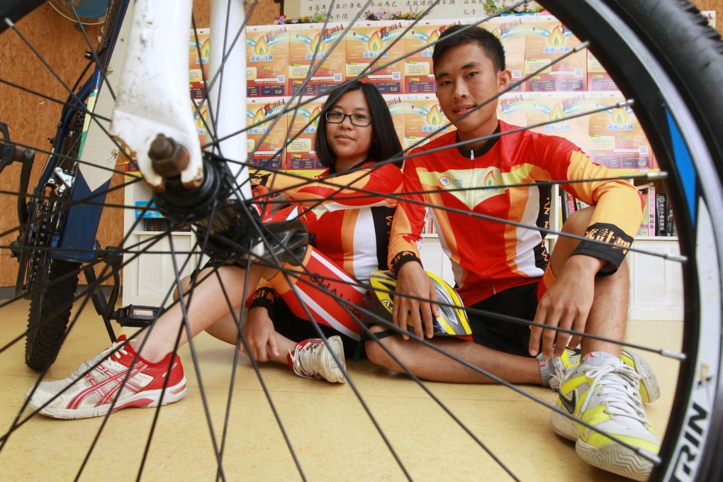 Ready to 'bite the bullet': Gigi Chiu Mei-yu and Chan Chi-keung will take off today on their punishing six-day trip around Taiwan. Photo: Edward Wong