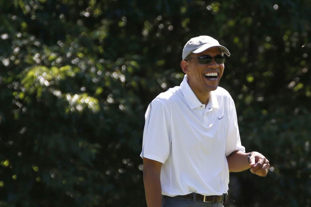 Barack Obama relaxes with a round of golf. Photo: Reuters