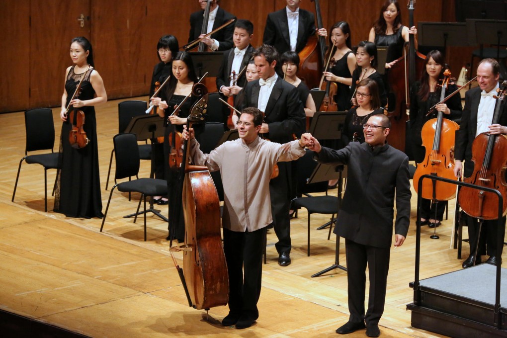 Edicson Ruiz (left) with conductor Chien Wen-pin.