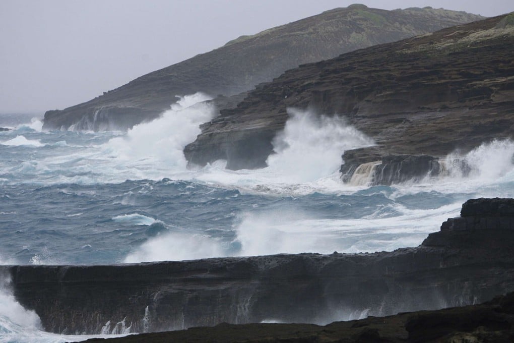 Large waves crash into the sea cliffs east side of Oahu as Tropical Storm Iselle passes through the Hawaiian islands, in Honolulu.