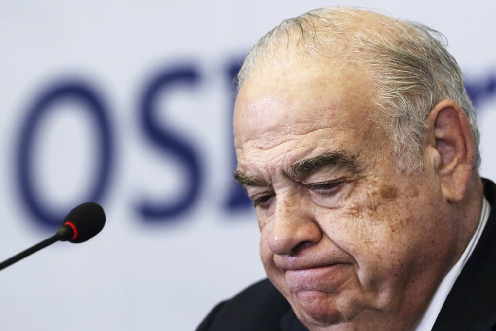 OSI Group Chairman and CEO Sheldon Lavin attends a news conference in Shanghai, July 28, 2014. Photo: Reuters