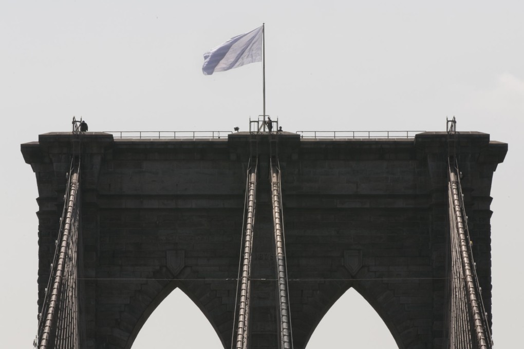One of the white flags that replaced the American flags. Photo: AP