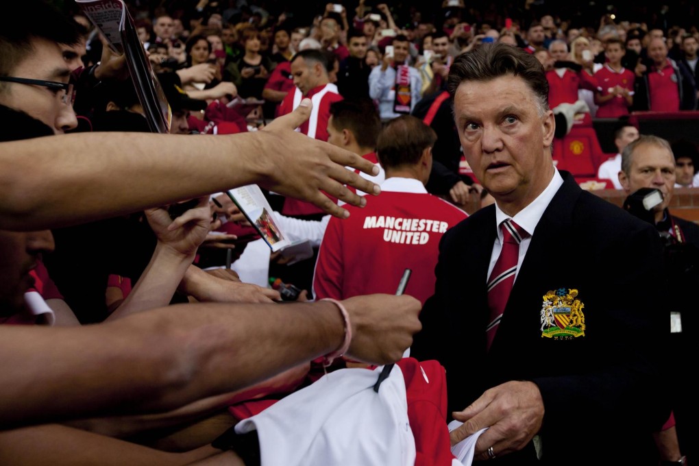 Louis van Gaal with fans before the match against Valencia. Photo: AP