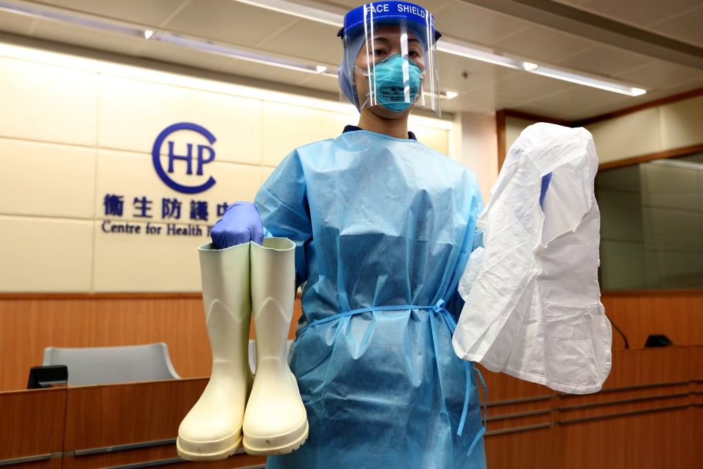 A nursing officer from the Hong Kong Health Department wears personal protective equipment recommended against the Ebola virus.