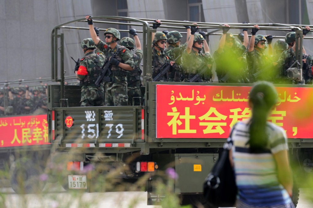 Security forces in a military drill in Hetian, Xinjiang. Photo: AFP