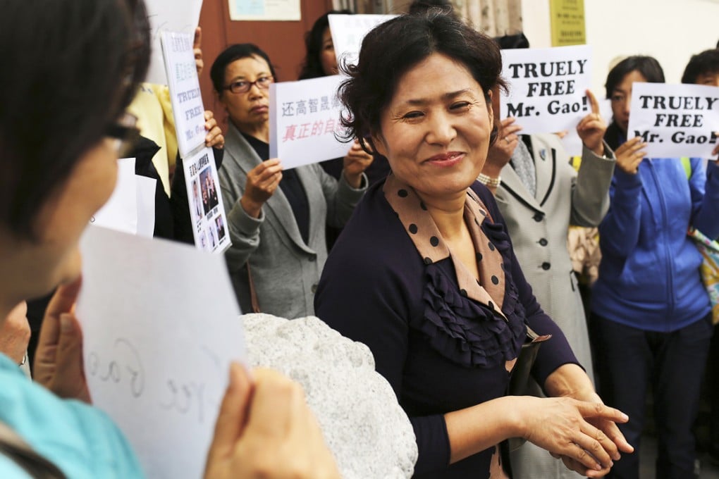 Geng He, wife of Gao Zhisheng, smiles at a news conference at the Chinese Consulate in San Francisco, California on August 7, 2014. Photo: Reuters