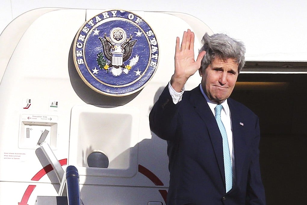 US Secretary of State John Kerry waves farewell after attending meetings in Sydney, Australia, on Wednesday. Photo: EPA