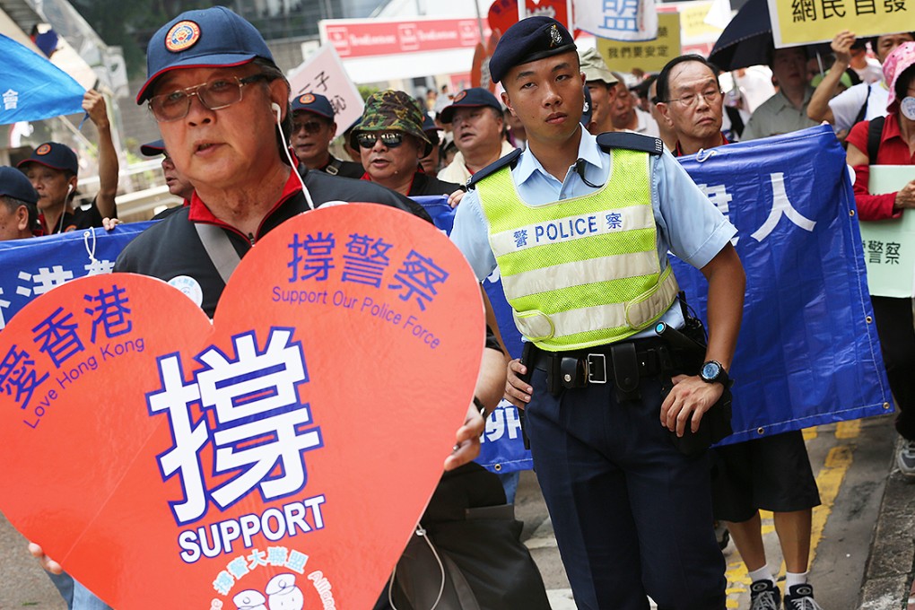 Supporters march to Police Headquarters for Chater Garden to support vigorous law enforcement by the police. Photo: Nora Tam