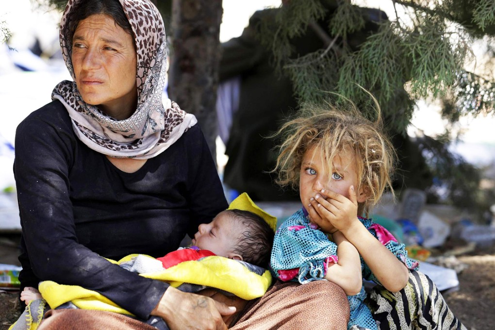 Families from the minority Yazidi sect have fled from Islamic State extremists as militants swept across northern Iraq. Photo: Reuters