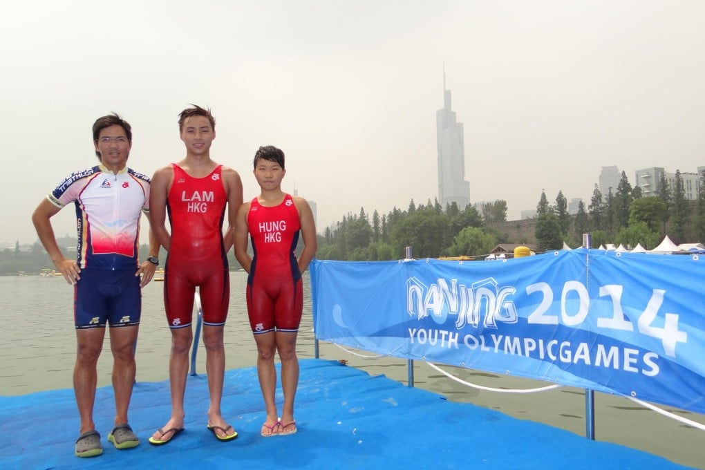Coach Jimmy Wan with triathletes Michael Lam and Chelsea Hung at the Xuanwu Lake in Nanjing. Photo: Kevin Kung