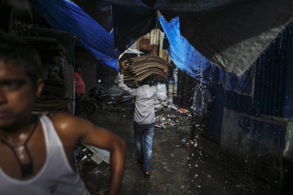 Apec must take on the barriers to trade that keep a significant number of people in Asia living in poverty. Photo: Bloomberg