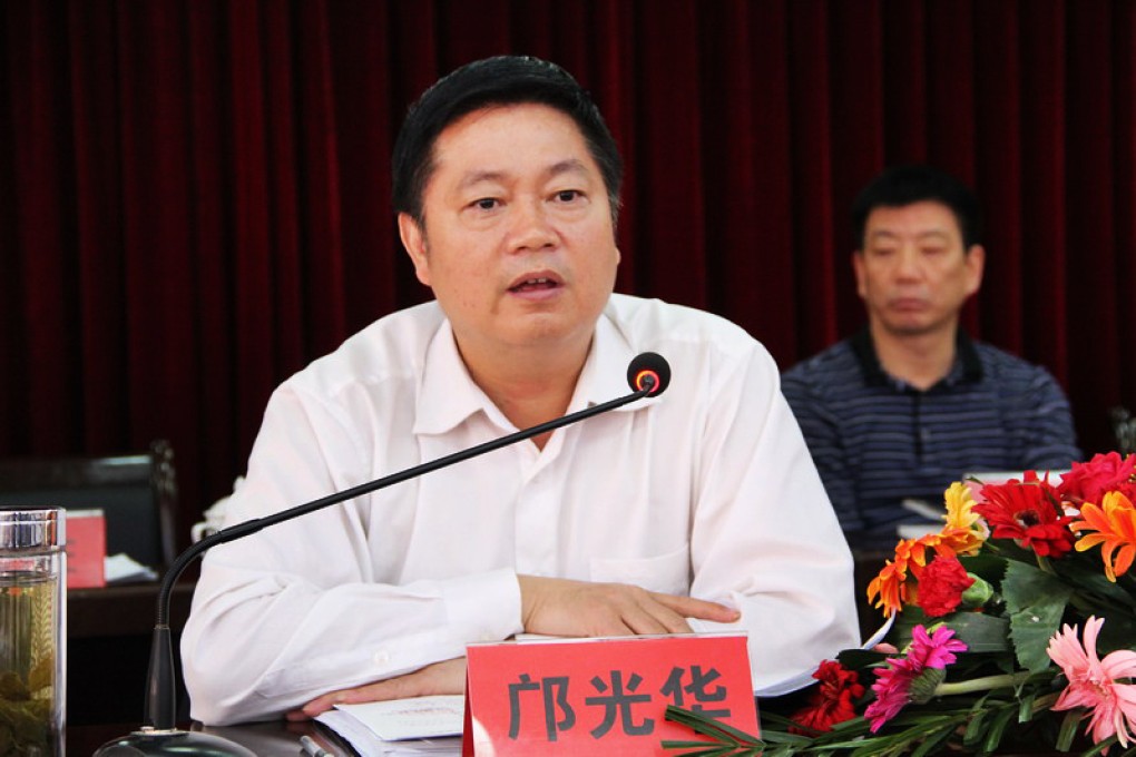 Kuang Guanghua, former Communist Party chief of Anyuan county in Jiangxi province, accused of abusing his power and accepting bribes.