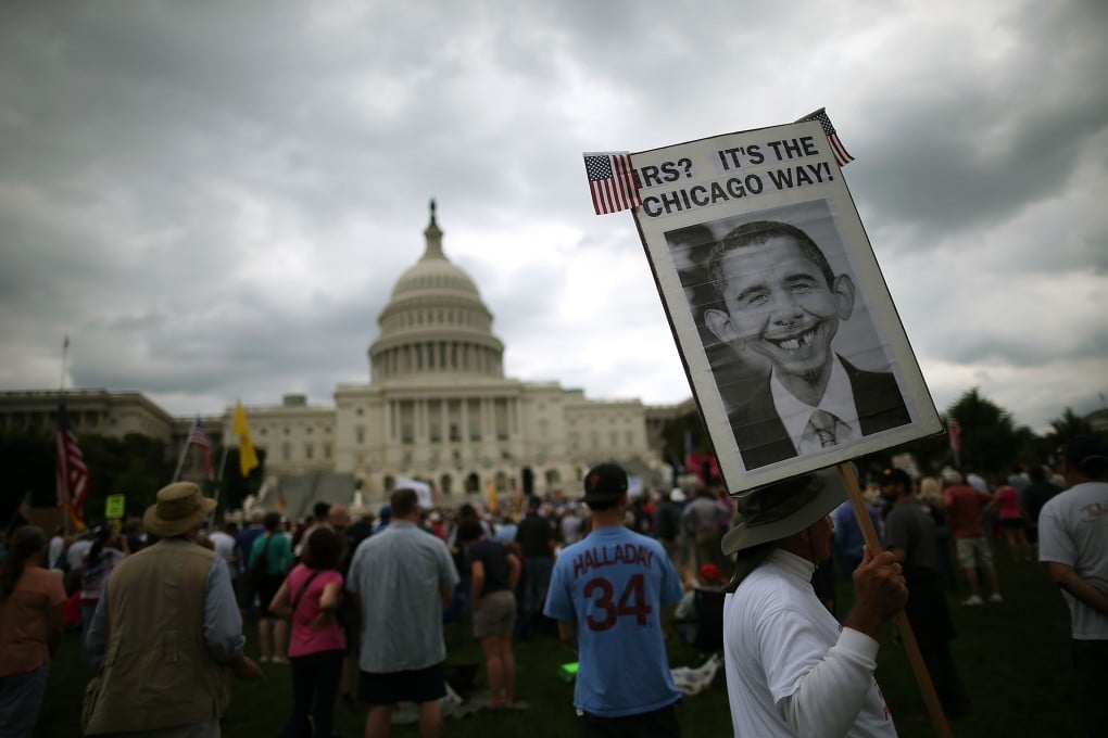 Tea Party activists attending a rally in Washington last year. The movement has the ability to swing votes. Photo: AFP