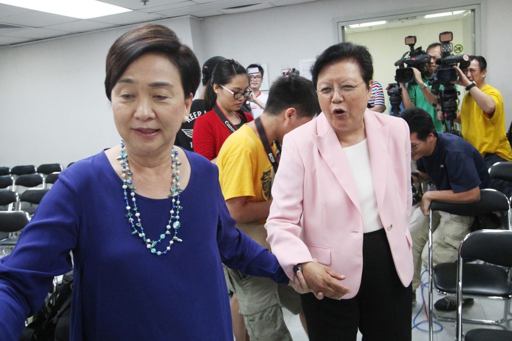 Emily Lau Wai-hing, chairwoman of the Democratic Party, escorts Rita Fan to a political seminar in Wan Chai. Photo: SMP