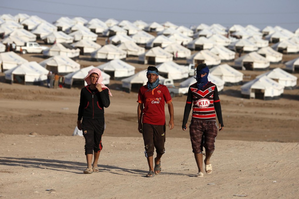 Yazidis shelter in a refugee camp in Iraq. Photo: Reuters